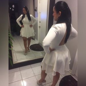 Nice short, long sleeve dress white. Size S from Bebe